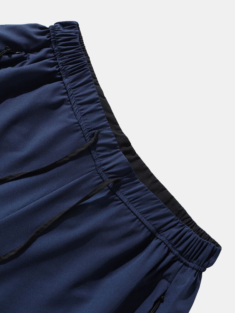 Herr Colorblock Zip Ficka Medellängd Activewear Bottoms