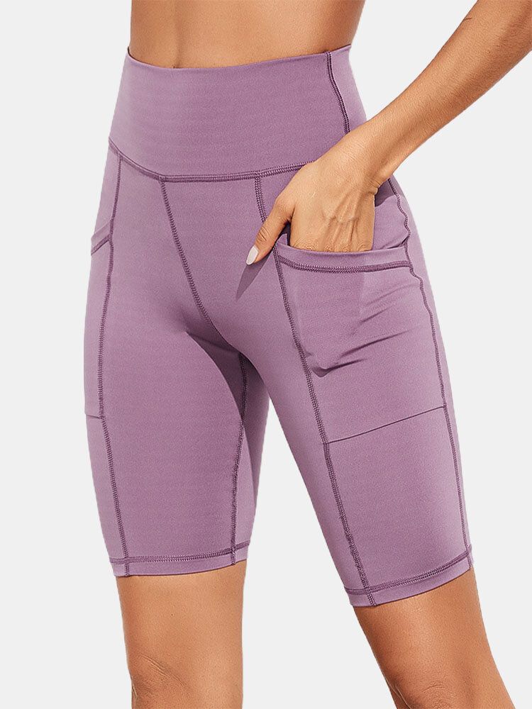 Enfärgad Ficka Slim Hip Lift Yoga Leggings